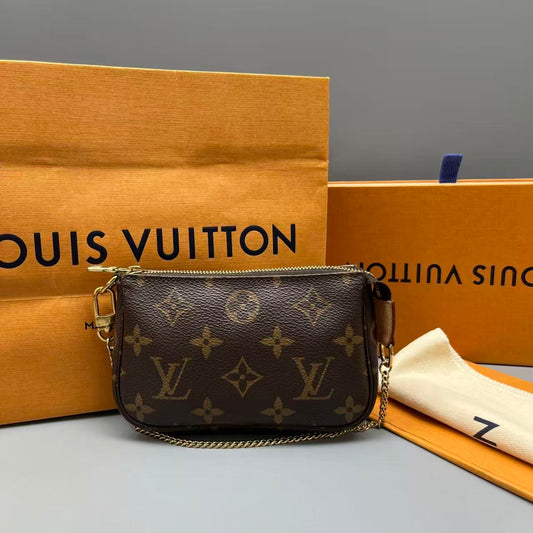 Louis Vuitton - Mini Pochette Accessoires - Monogram coated canvas with natural cowhide leather trim - Brown - (mini)