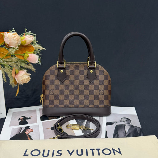 Louis Vuitton - Alma BB - Damier Ebene coated canvas with smooth leather trim - Brown - (mini)