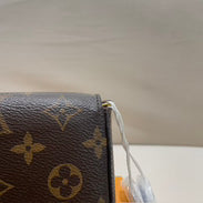 Louis Vuitton - Pochette Félicie - Monogram coated canvas with grained leather trim and interior - Brown - (mini)