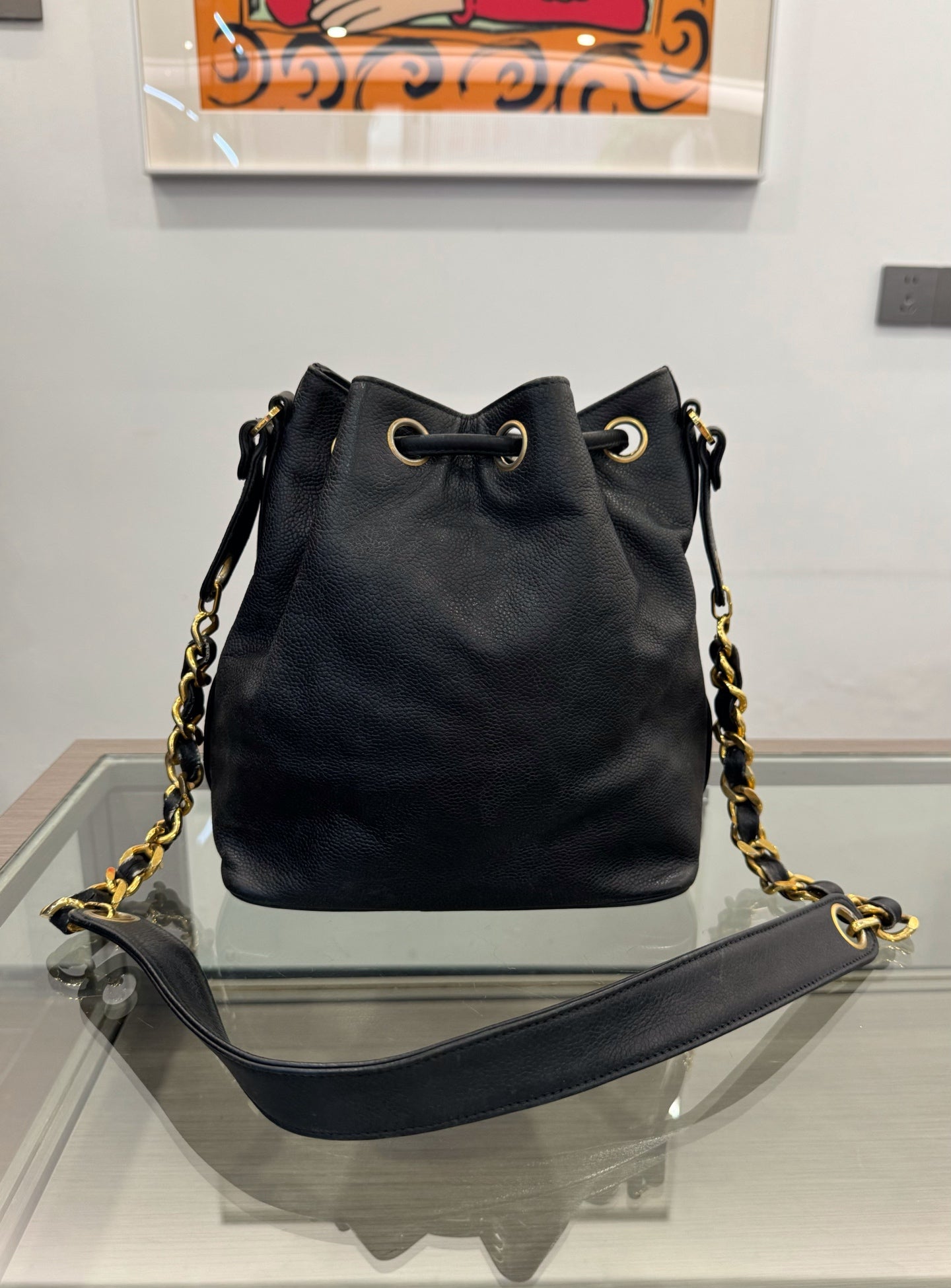 Chanel - Drawstring Bucket Bag with Gold Ball Charms - Grained leather - Black - (small)
