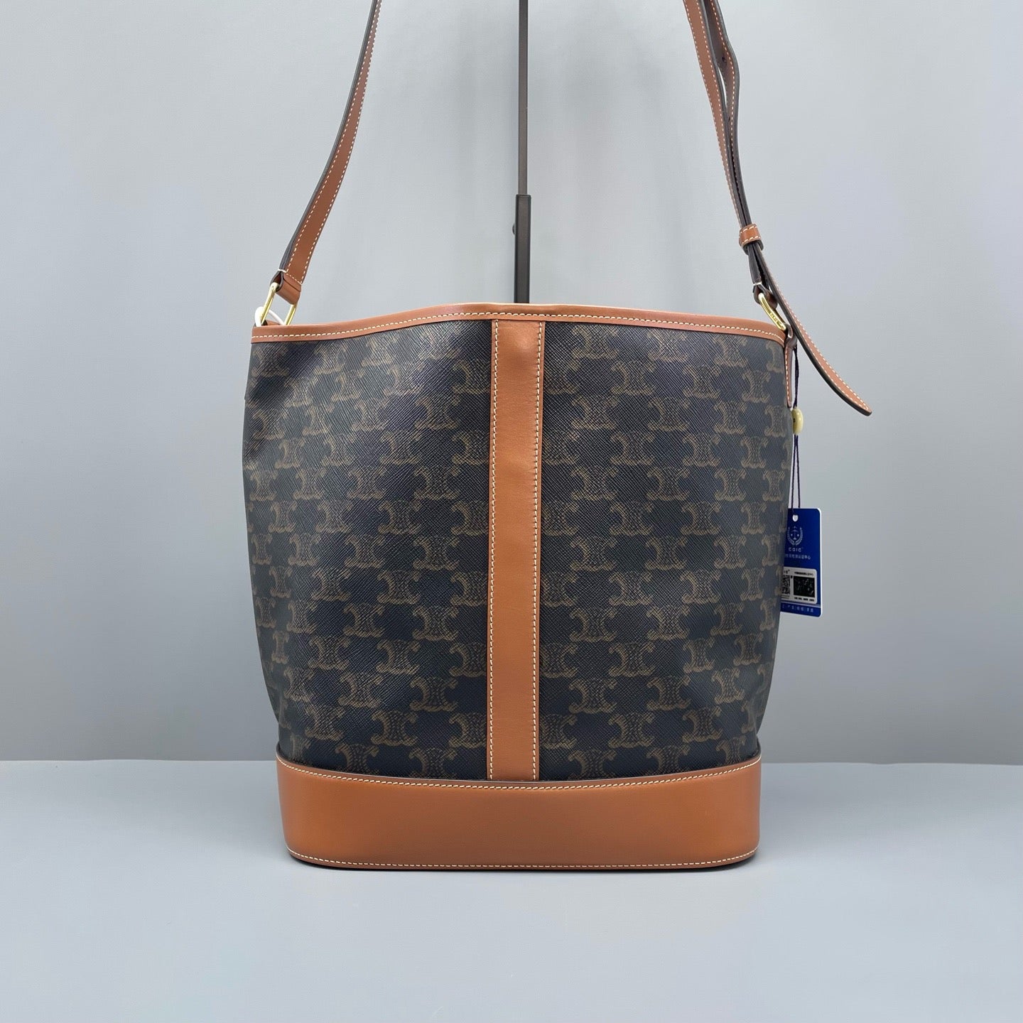 Celine - Triomphe Canvas Medium Bucket Bag - Triomphe coated canvas with calfskin leather trim - Brown - (Medium)