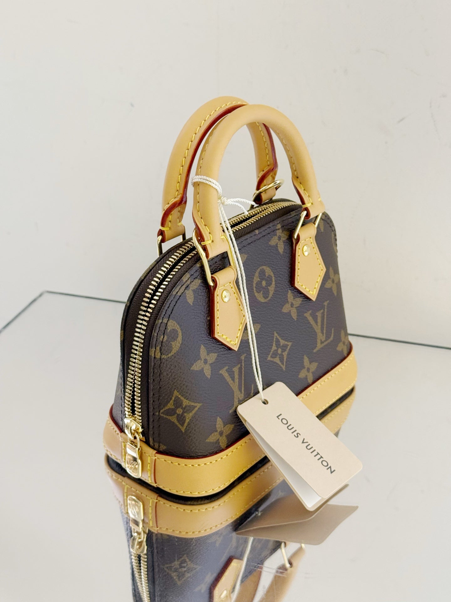 Louis Vuitton - Alma Nano - Monogram coated canvas with Vachetta leather trim - Brown - (mini)