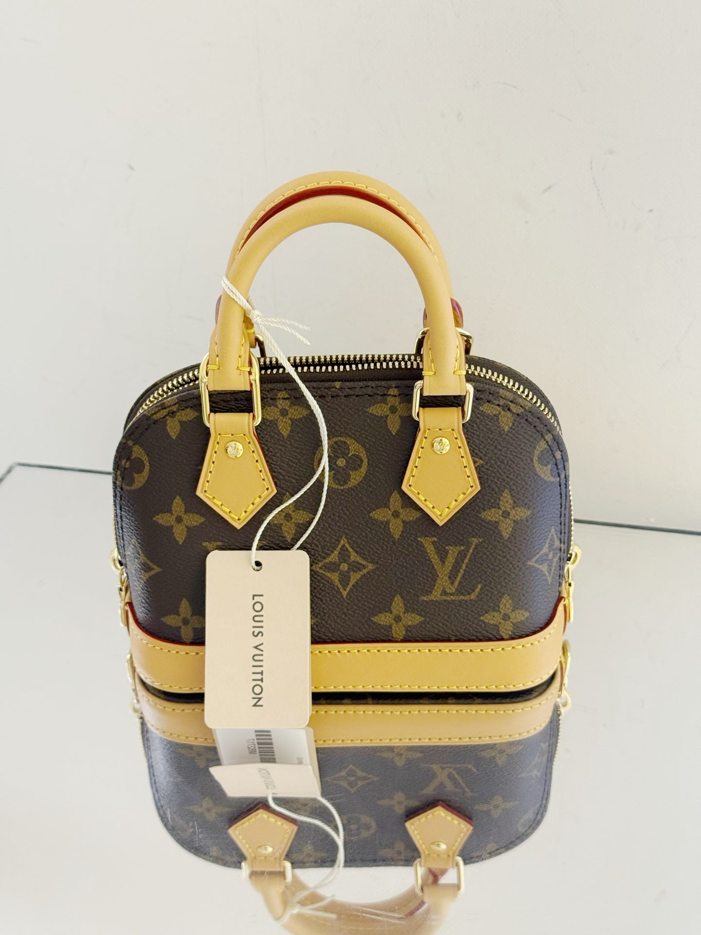 Louis Vuitton - Alma Nano - Monogram coated canvas with Vachetta leather trim - Brown - (mini)