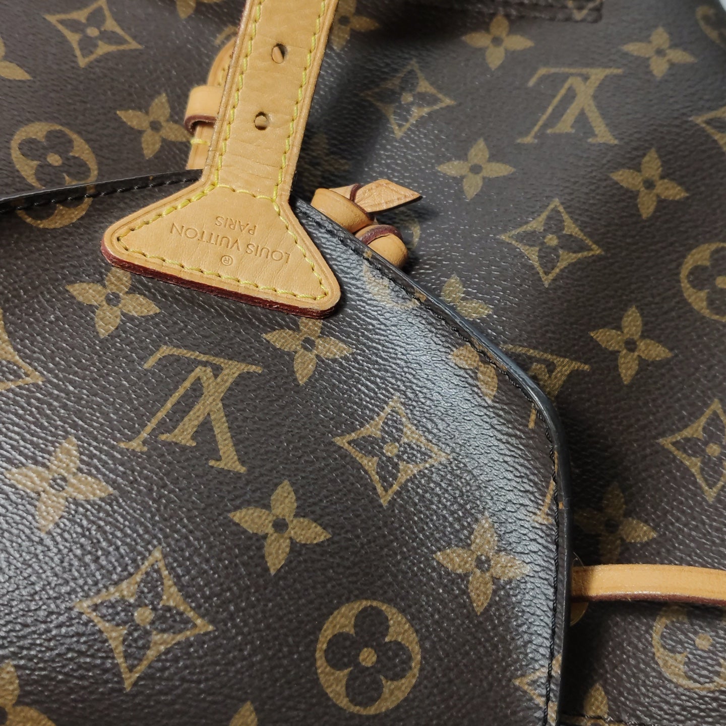 Louis Vuitton - Montsouris M45501 - Monogram coated canvas with natural Vachetta leather trim - Brown - (Medium)