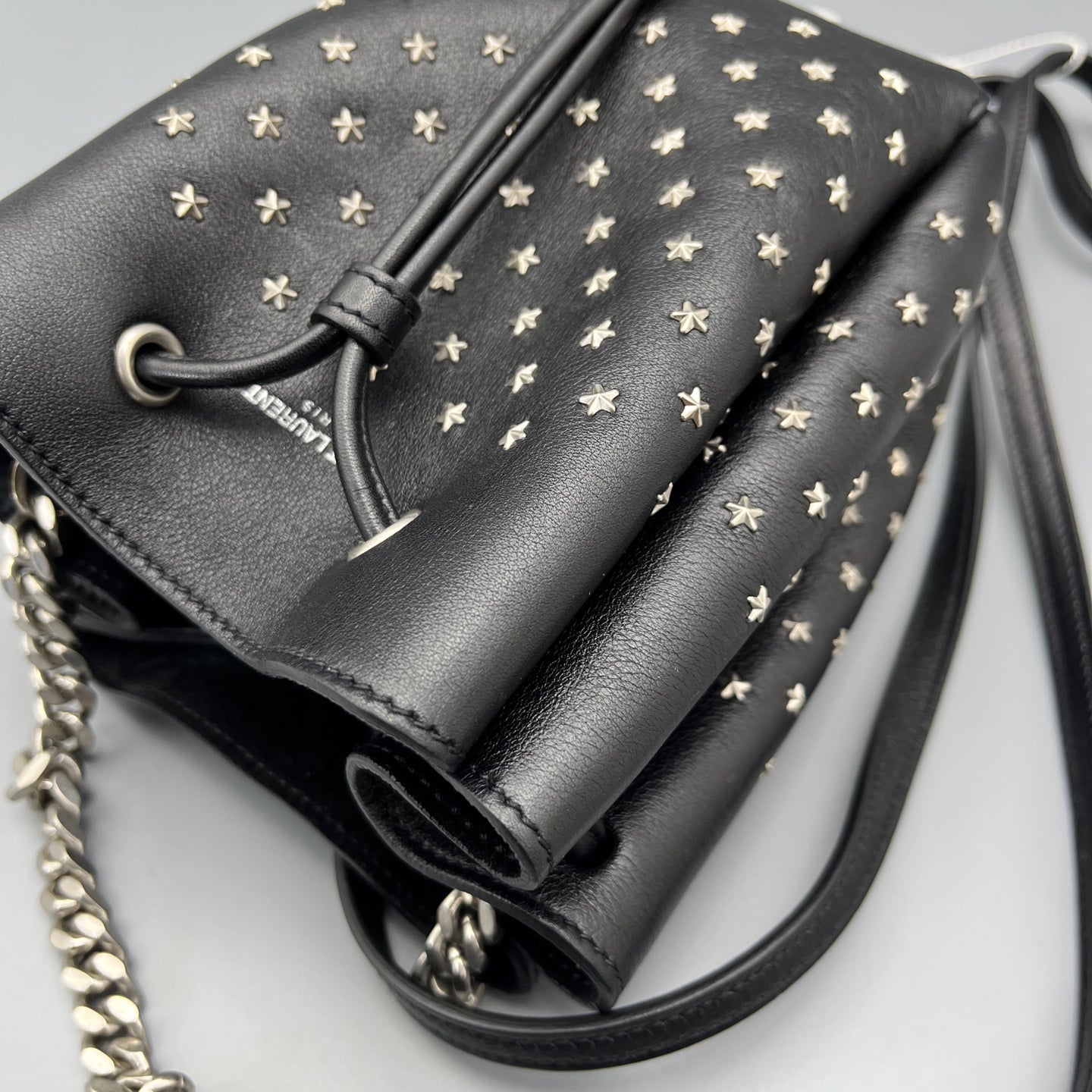 Saint Laurent - Studded Drawstring Bucket Bag - Grained leather - Black - (mini)