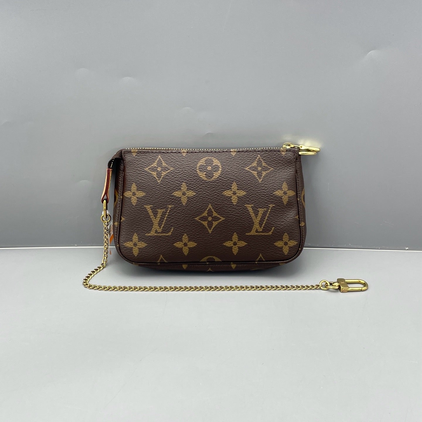Louis Vuitton - Mini Pochette Accessoires - Monogram coated canvas with Vachetta leather trim - Brown - (mini)