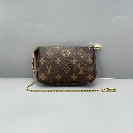 Louis Vuitton - Mini Pochette Accessoires - Monogram coated canvas with Vachetta leather trim - Brown - (mini)