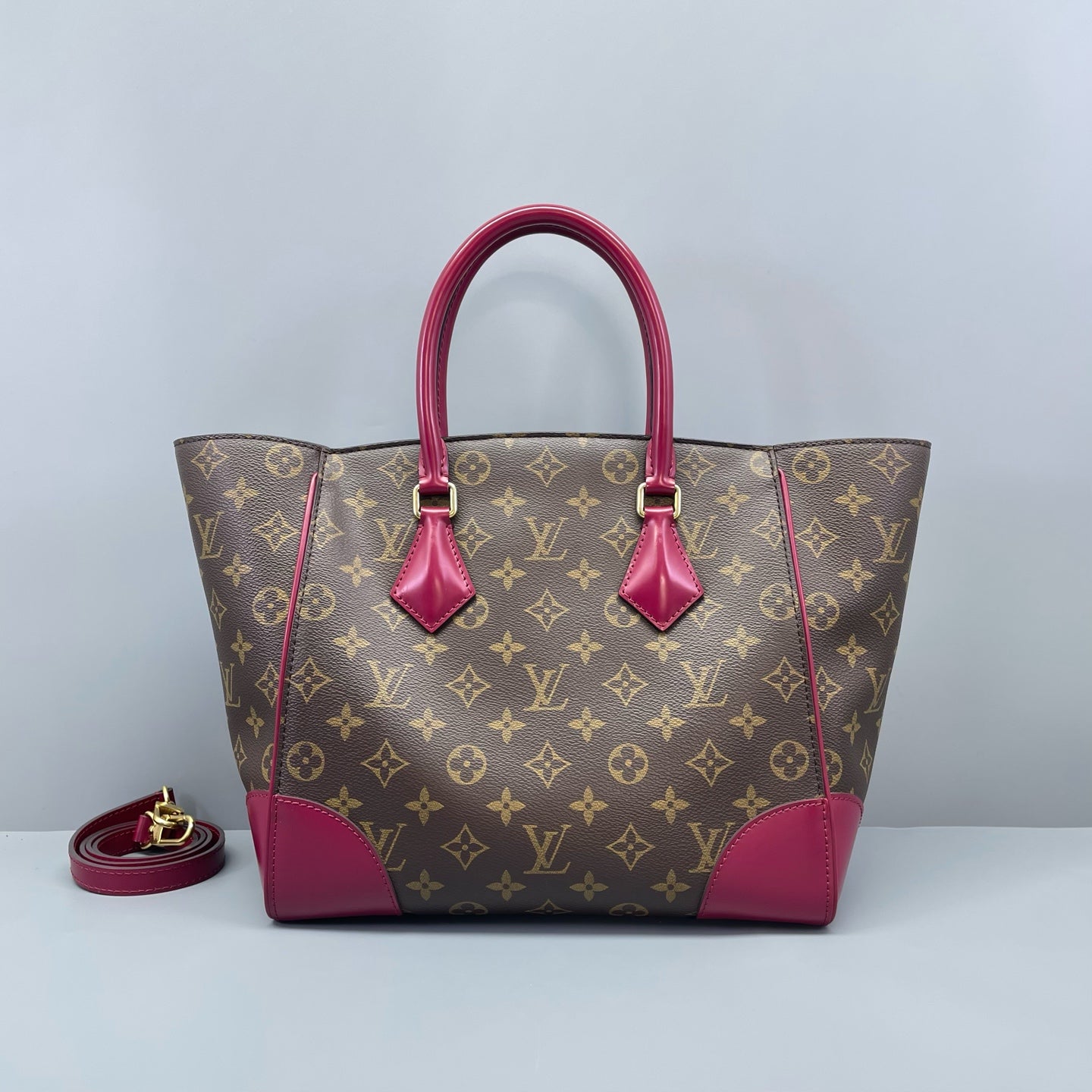 Louis Vuitton - Phenix PM - Monogram coated canvas with fuchsia leather trim - Brown and Fuchsia - (medium)