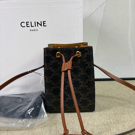 Celine - Sailor Bucket Bag - Triomphe coated canvas with calfskin leather trim and canvas lining - Black and Brown - (mini)