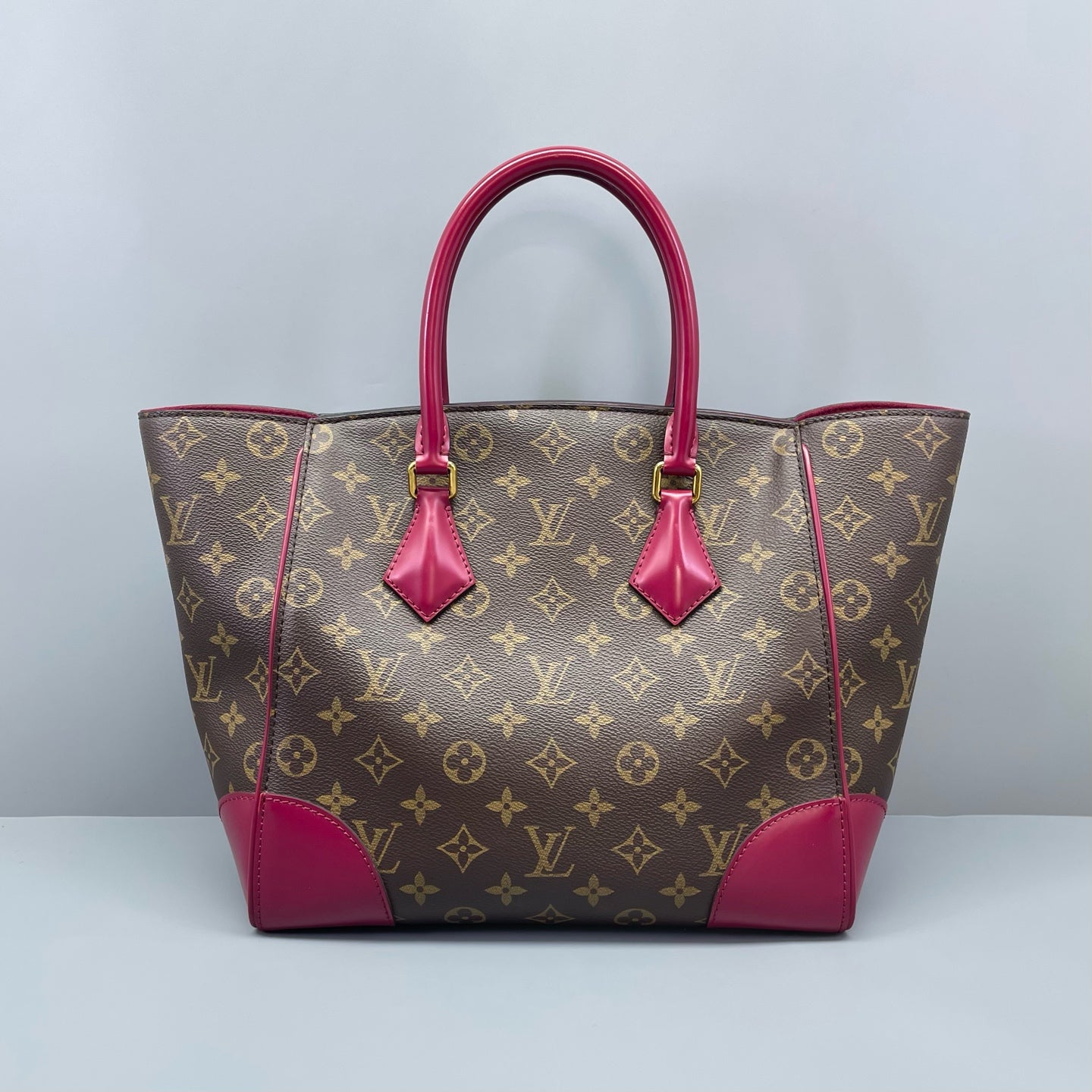 Louis Vuitton - Phenix PM - Monogram coated canvas with fuchsia leather trim - Brown and Fuchsia - (medium)