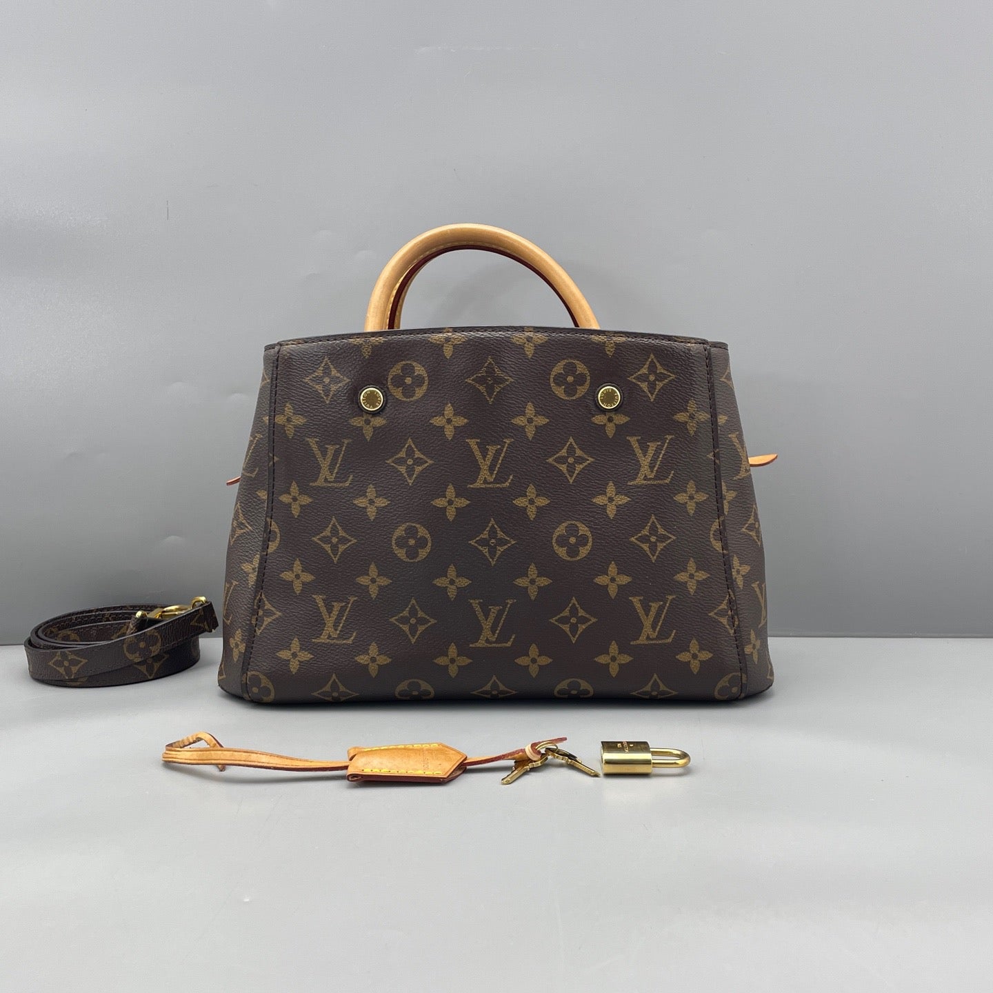 Louis Vuitton - Montaigne BB Monogram - Monogram coated canvas with natural Vachetta leather trim - Brown - (small)
