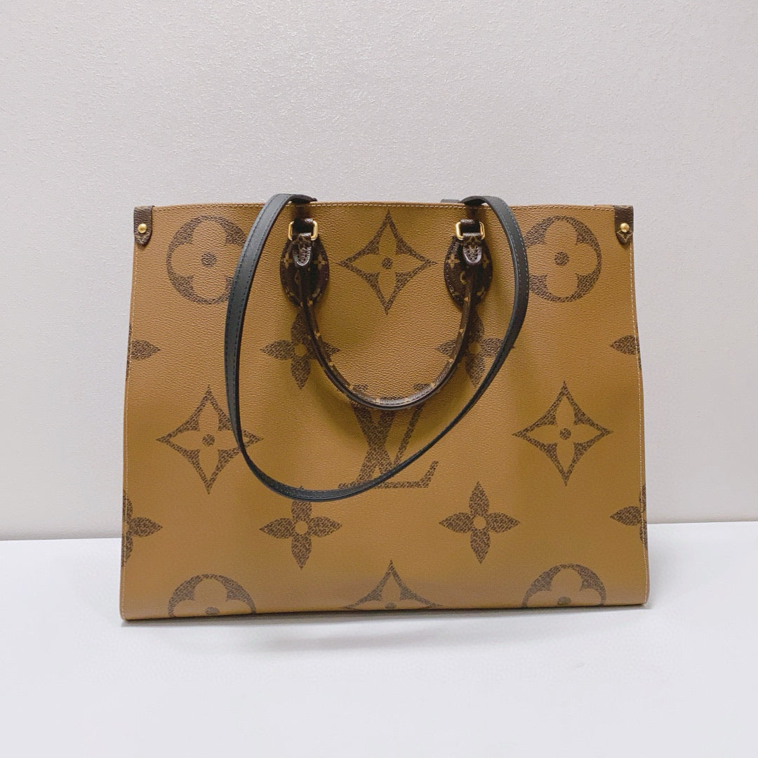 Louis Vuitton - OnTheGo GM - Monogram coated canvas with leather trim - Brown - (Large)