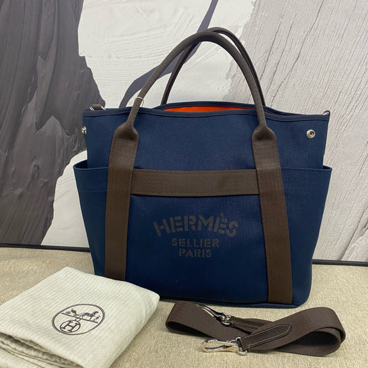 Hermès - Groom Canvas Equestrian Bag - Canvas and Leather - Dark Blue with Brown Accents and Orange Interior - (Large)