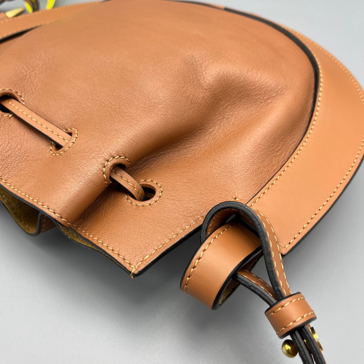 Loewe - Disc Bucket Bag - Pebbled leather and smooth leather trim, suede interior - Caramel - (Small)