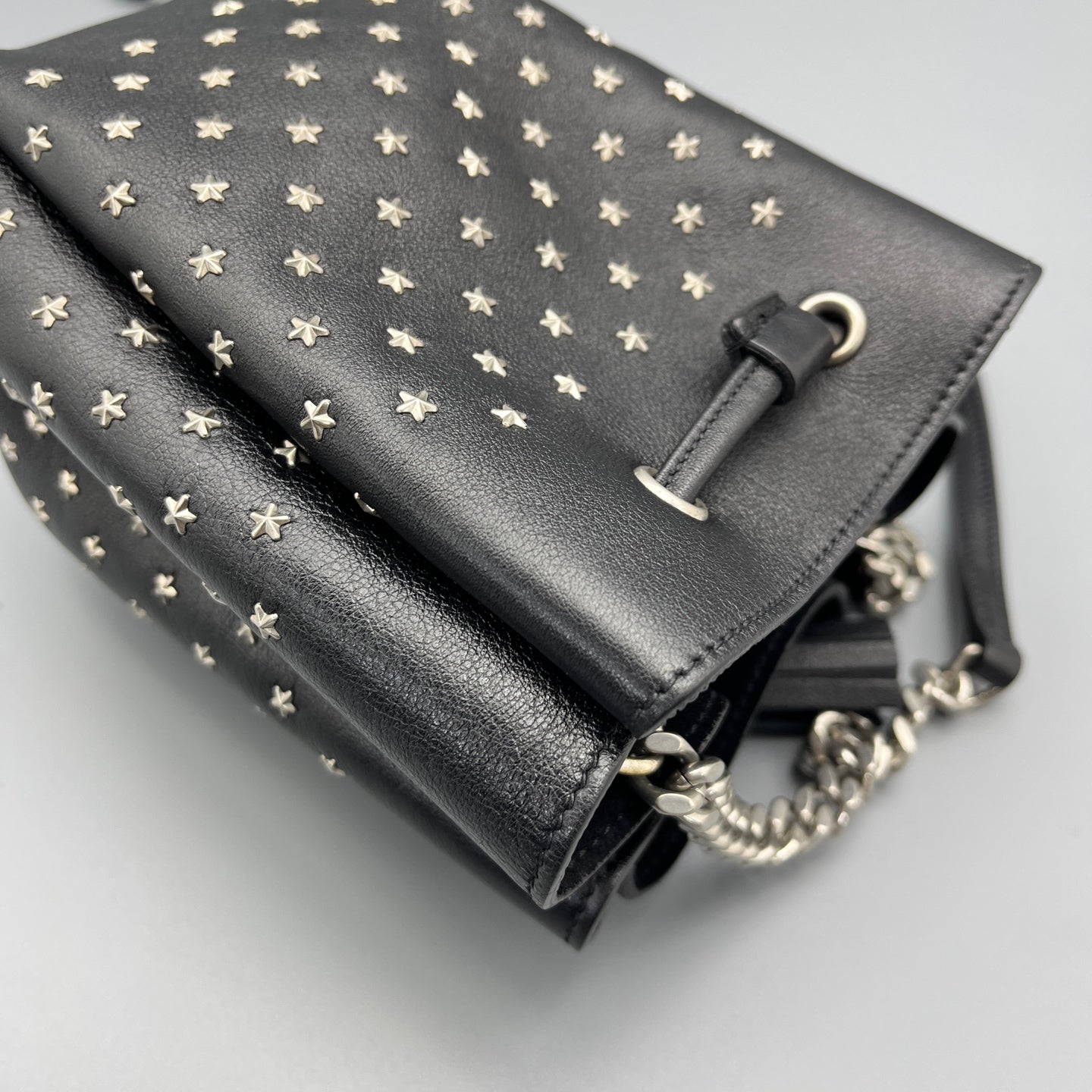 Saint Laurent - Studded Drawstring Bucket Bag - Grained leather - Black - (mini)