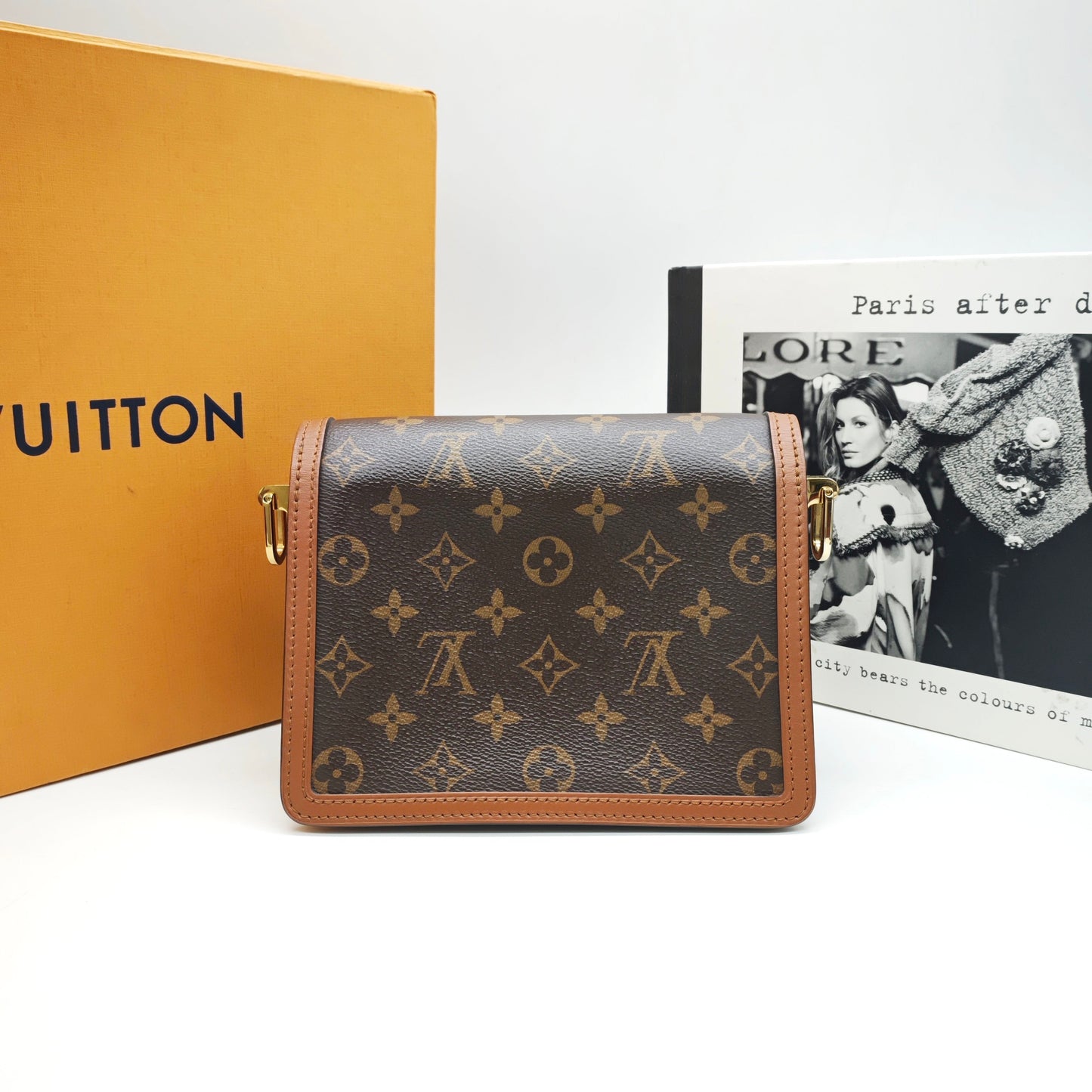 Louis Vuitton - Dauphine Small - Monogram coated canvas with natural cowhide leather trim and microfiber lining - Brown - (small)