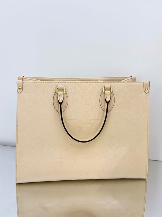 Louis Vuitton - Onthego MM - Embossed cowhide leather - Cream white - (medium)