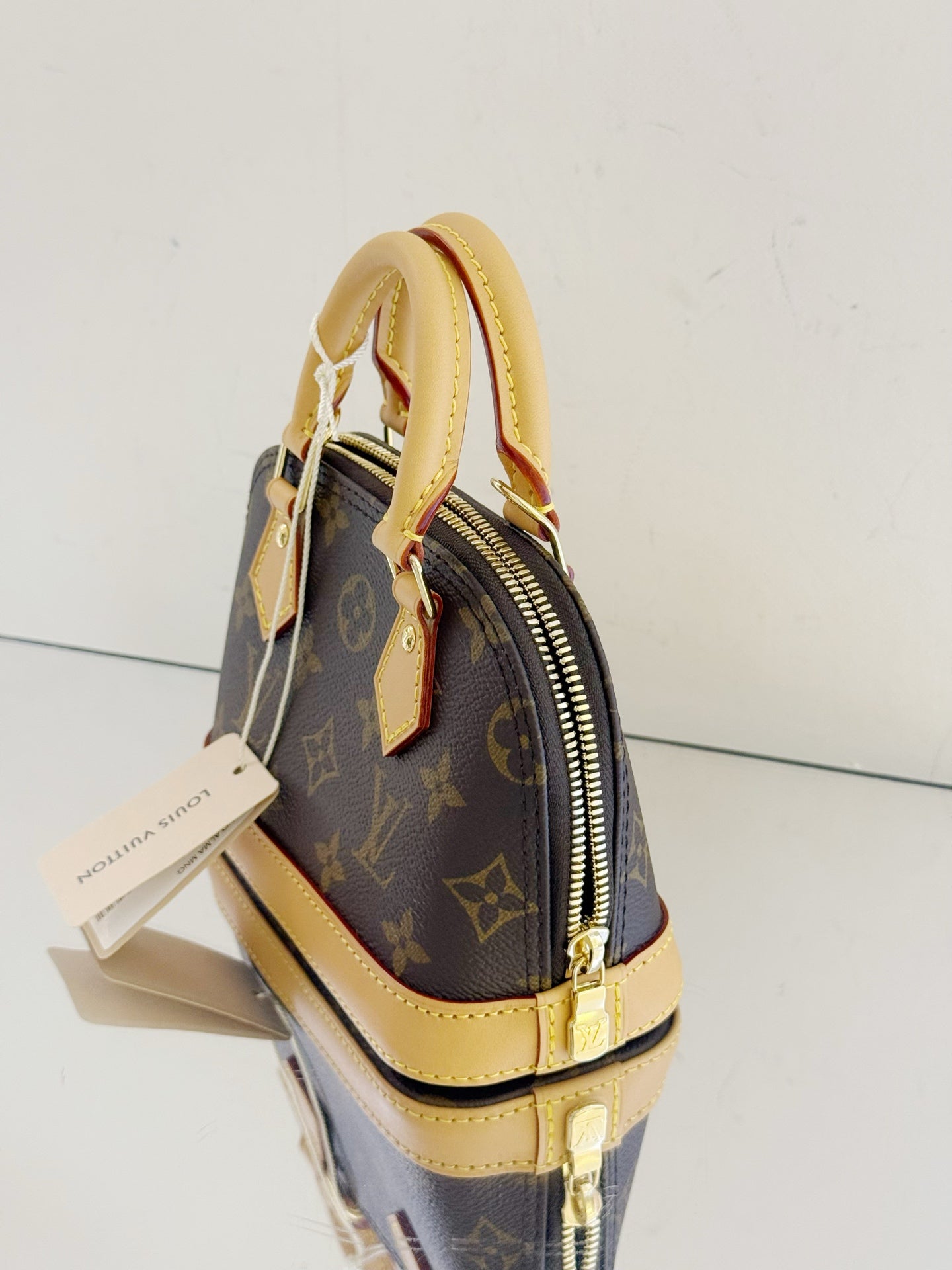 Louis Vuitton - Alma Nano - Monogram coated canvas with Vachetta leather trim - Brown - (mini)