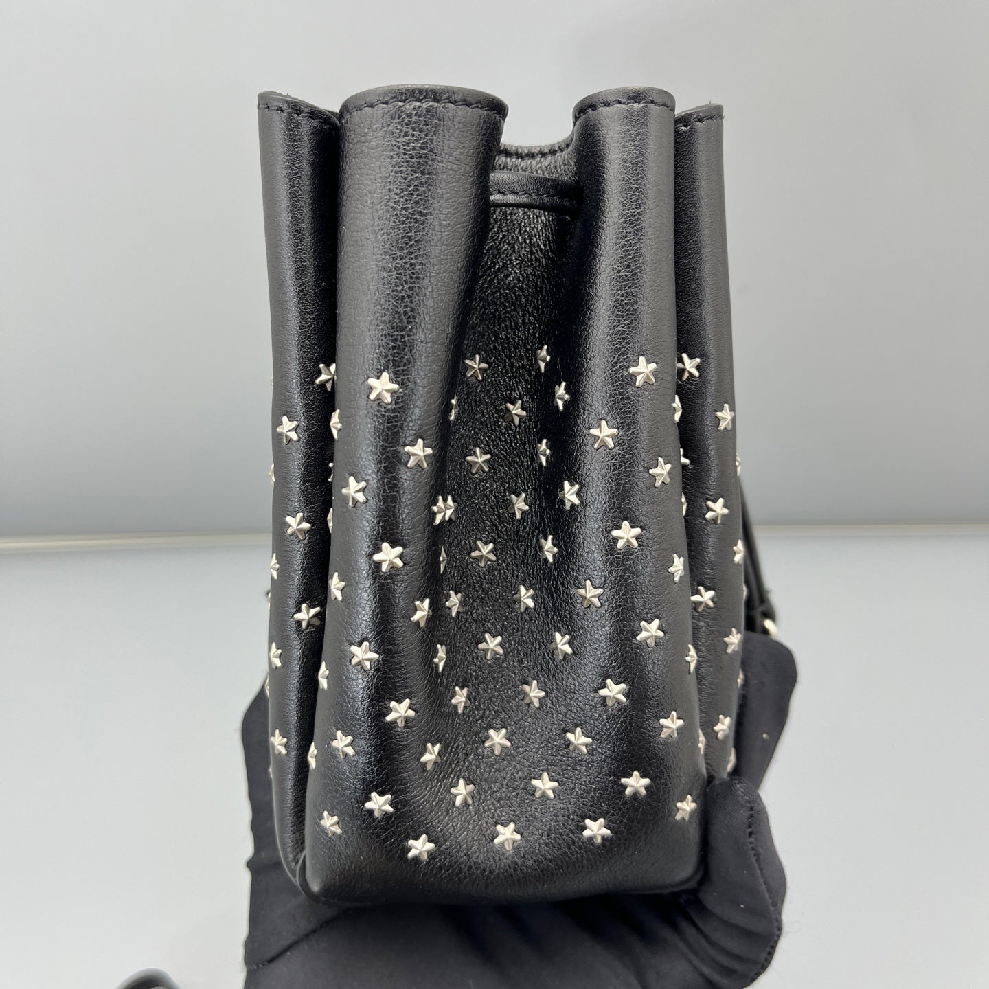 Saint Laurent - Studded Drawstring Bucket Bag - Grained leather - Black - (mini)