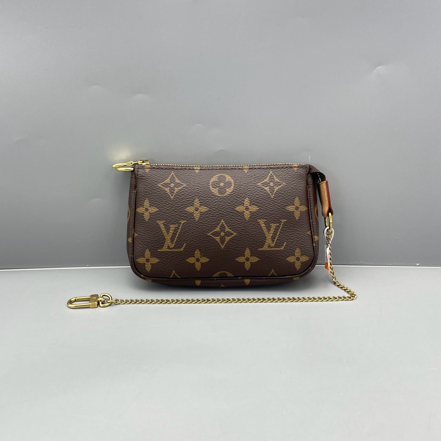 Louis Vuitton - Mini Pochette Accessoires - Monogram coated canvas with Vachetta leather trim - Brown - (mini)