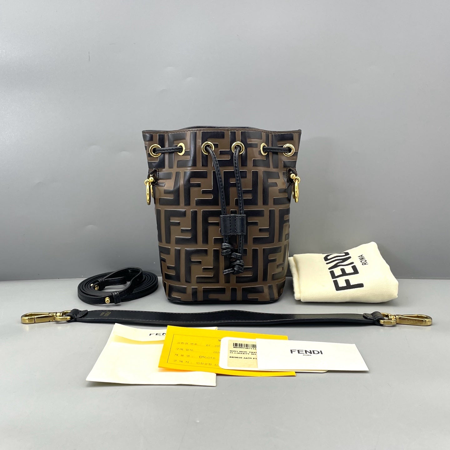 Fendi - Mon Tresor Mini Bucket Bag - Embossed leather - Brown and Black with Gold-Tone Hardware - (mini)