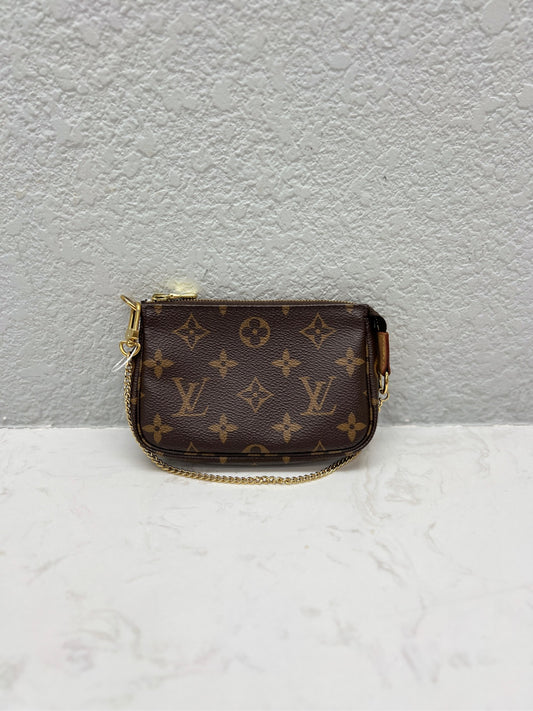 Louis Vuitton - Mini Pochette Accessoires - Monogram coated canvas with natural cowhide leather trim - Brown - (mini)