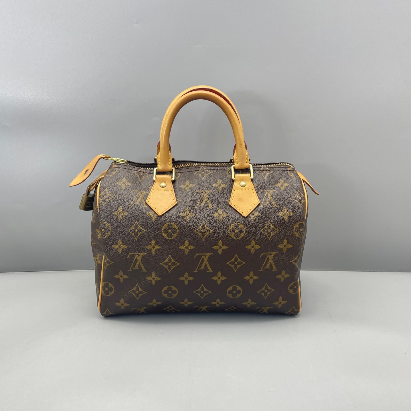 Louis Vuitton - Speedy 25 - Monogram coated canvas with Vachetta leather trim - Brown - (small)