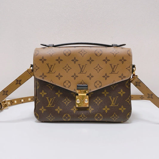 Louis Vuitton - Pochette Metis - Monogram coated canvas with leather trim - Brown - (Medium)