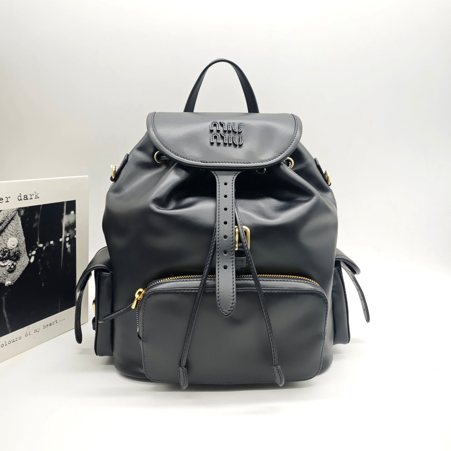Miu Miu - Drawstring Flap Backpack - Leather - Black - (medium)