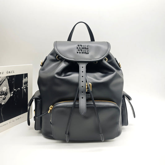Miu Miu - Drawstring Flap Backpack - Leather - Black - (medium)