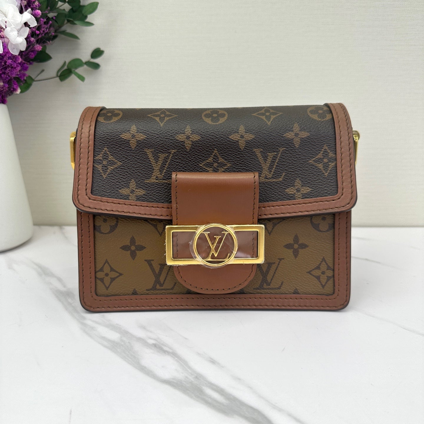 Louis Vuitton - Dauphine - Monogram coated canvas with leather trim - Brown - (small)
