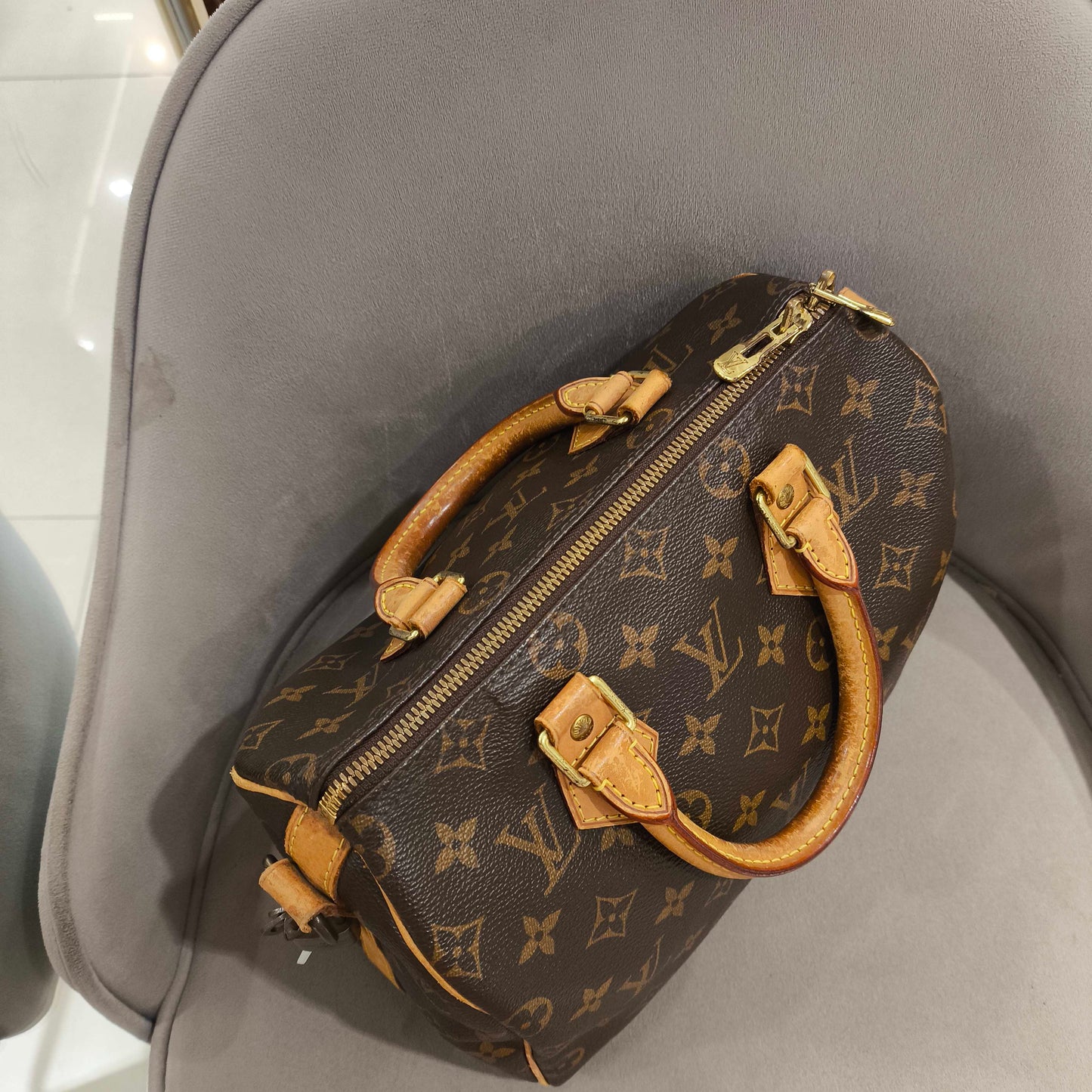 Louis Vuitton - Speedy 25 Bandouliere - Monogram coated canvas with natural cowhide leather trim - Brown - (Small)
