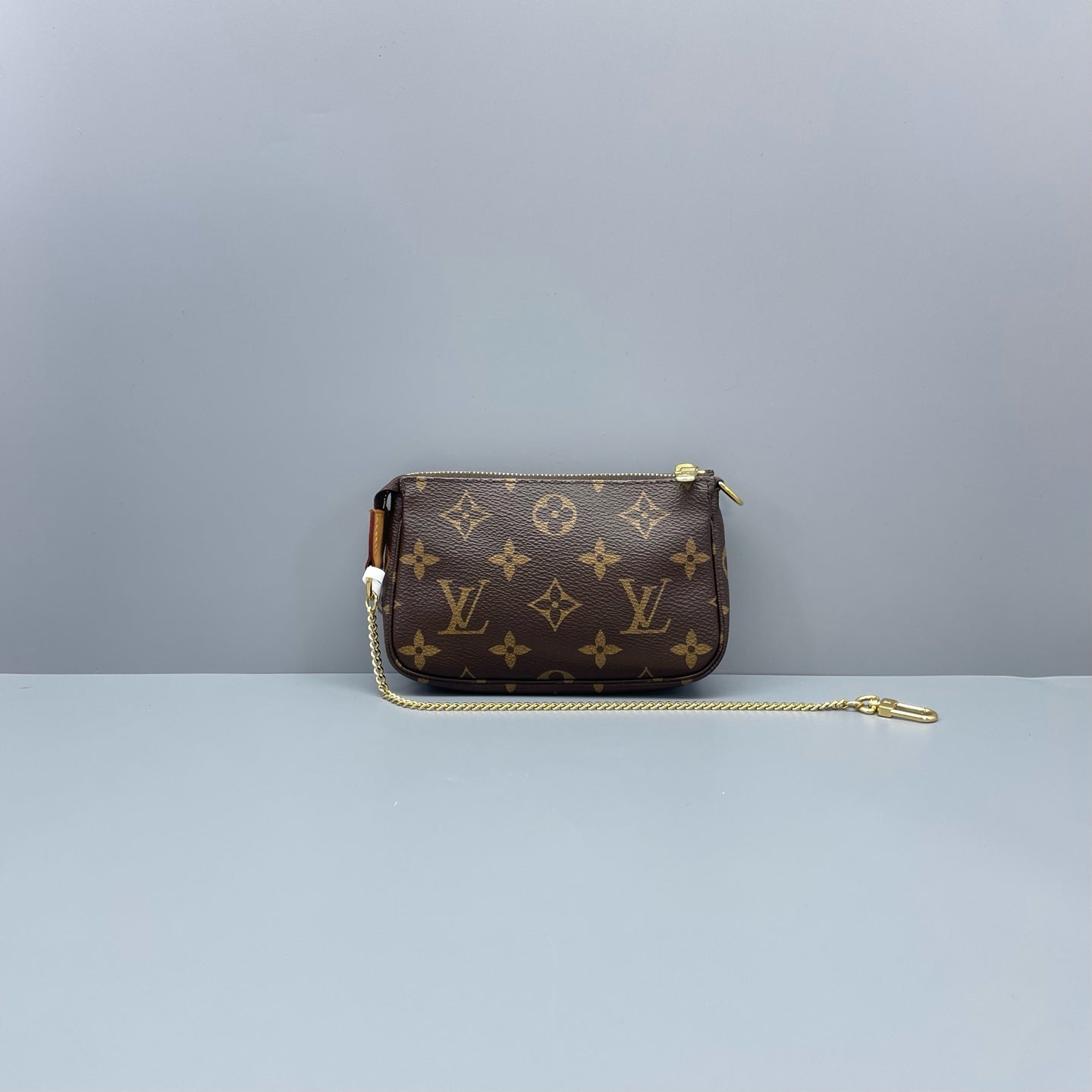 Louis Vuitton - Mini Pochette Accessoires - Monogram coated canvas with Vachetta leather trim - Brown - (mini)