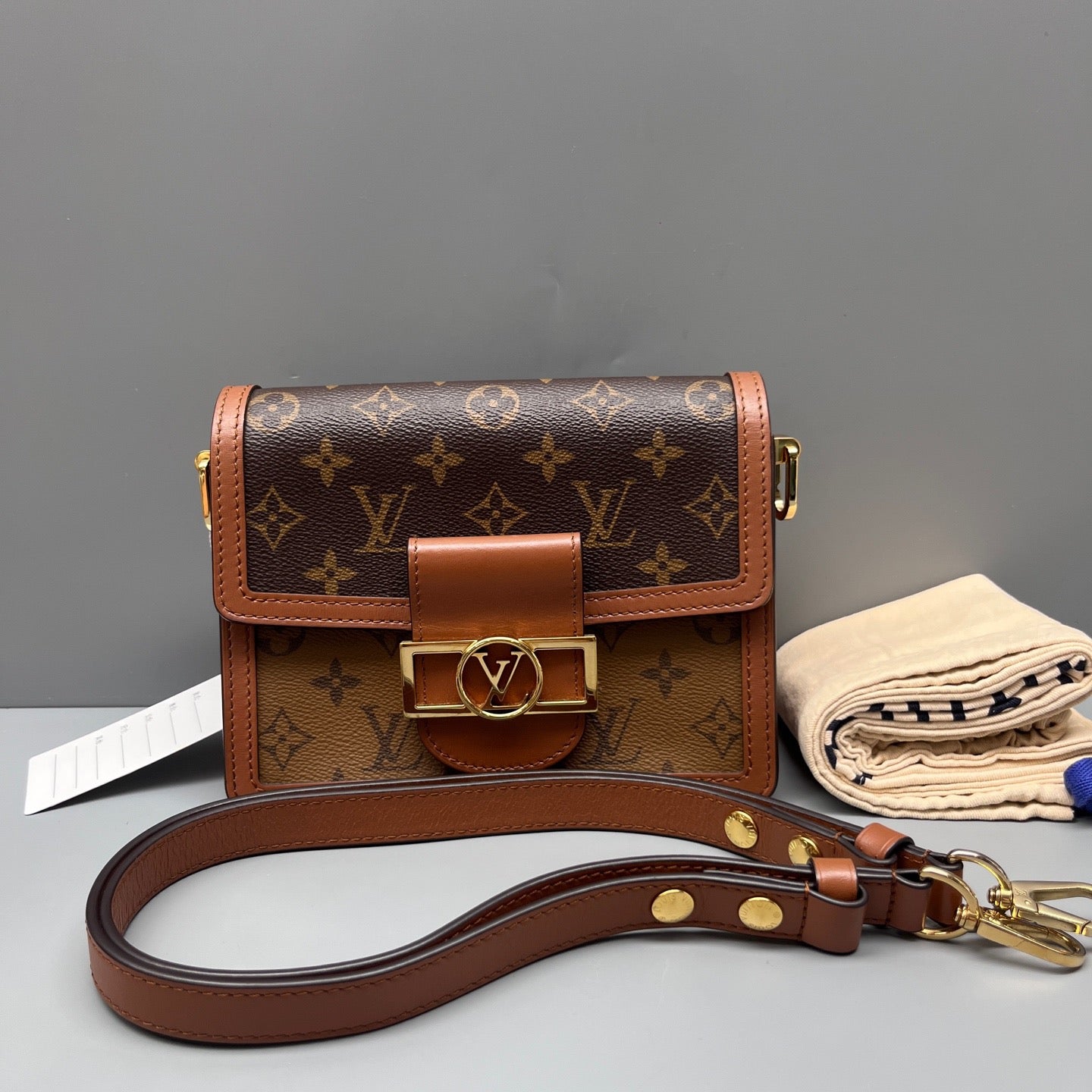 Louis Vuitton - Dauphine Pochette - Monogram coated canvas with leather trim - Brown - (small)