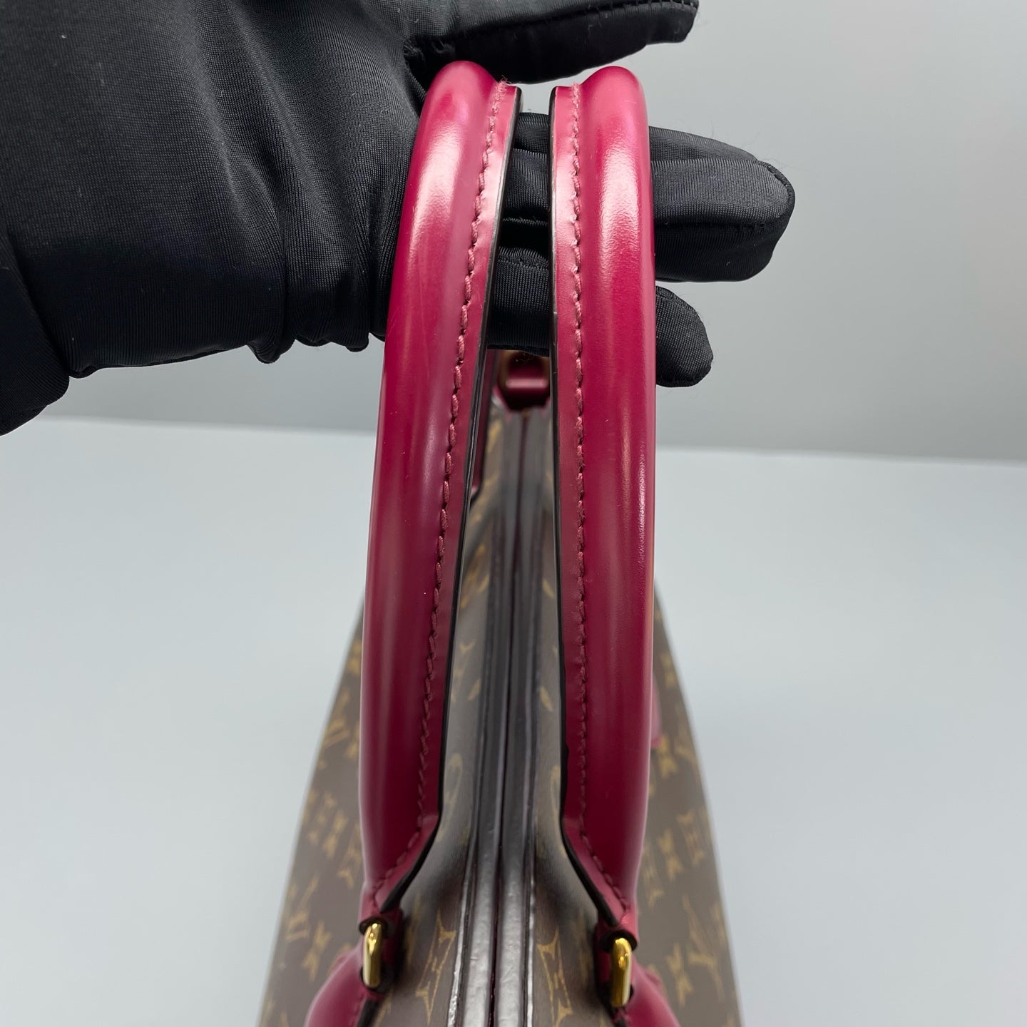 Louis Vuitton - Phenix PM - Monogram coated canvas with fuchsia leather trim - Brown and Fuchsia - (medium)