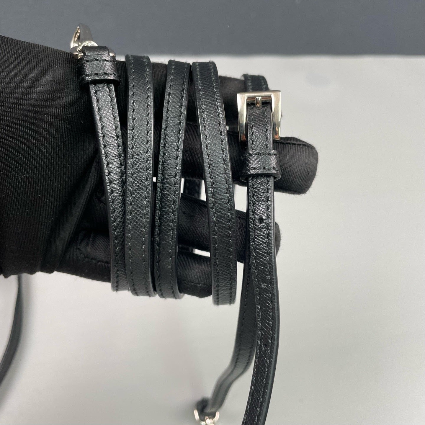 Prada - Grommet Embellished Drawstring Bucket Bag - Nylon fabric with leather trim - Black - (small)
