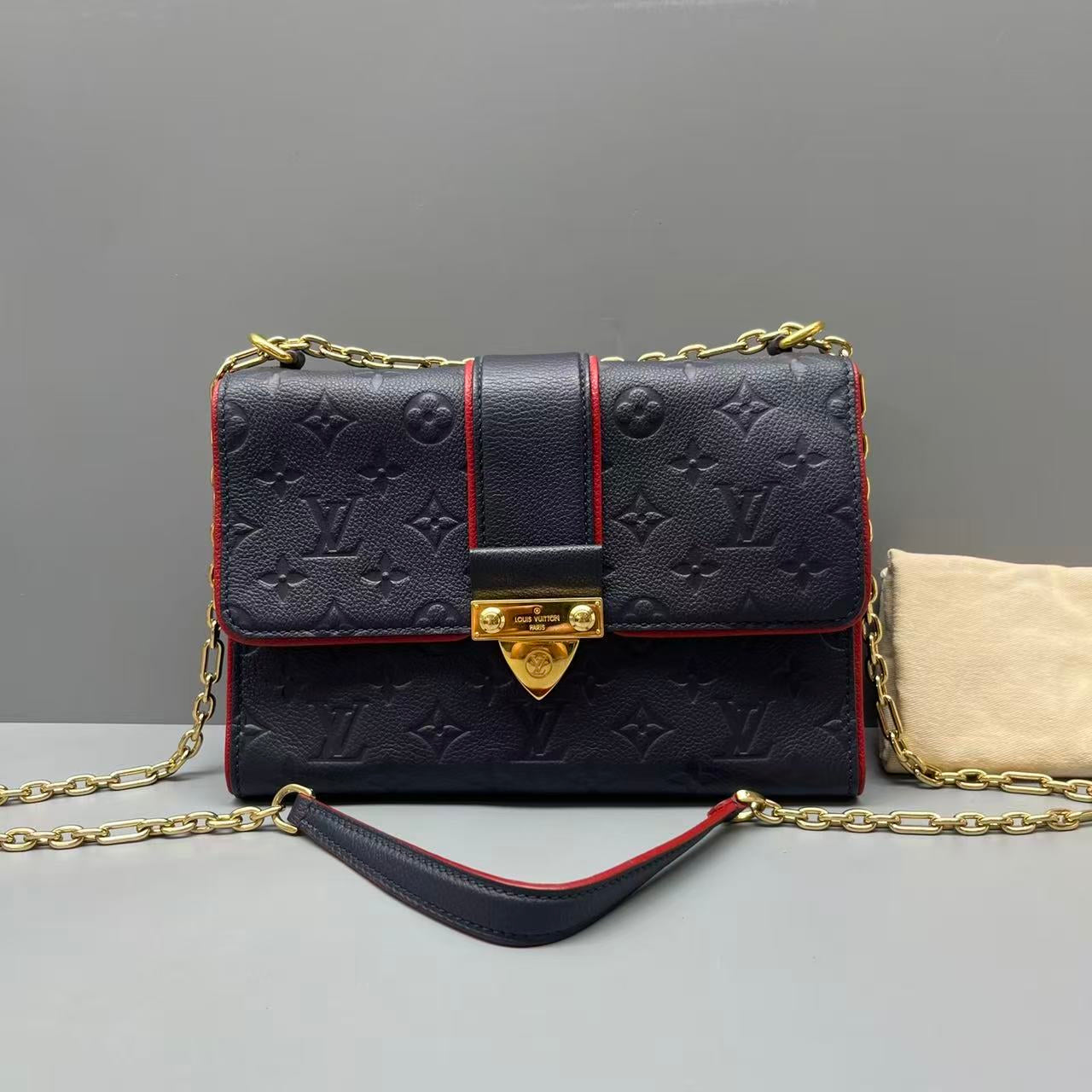 Louis Vuitton - Saint Sulpice PM - Monogram Empreinte leather - Navy with Red accents - (medium)