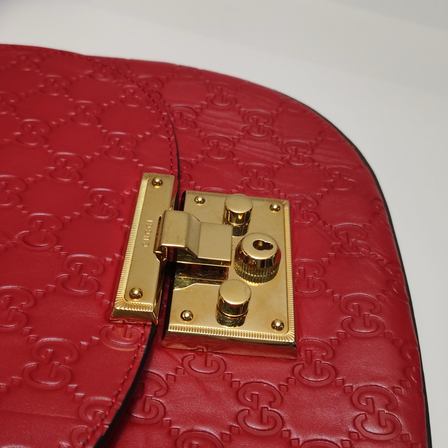 Gucci - Padlock Saddle Bag - Gucci Signature embossed leather with suede lining - Red with navy and red web strap - (small)