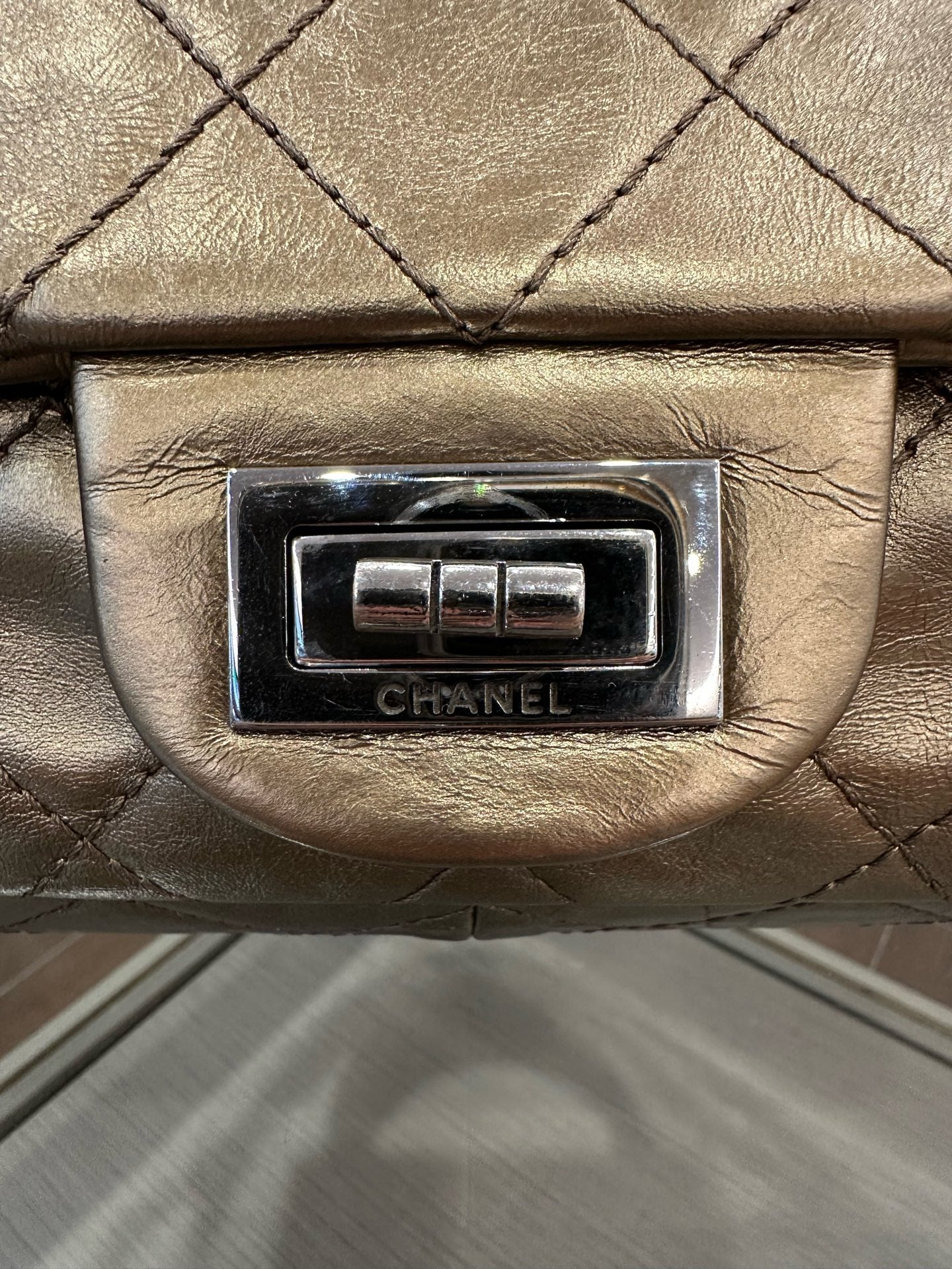 Chanel - 2.55 Reissue Flap Bag - Aged Calfskin Leather - Bronze with Silver-Tone Hardware - (Large)