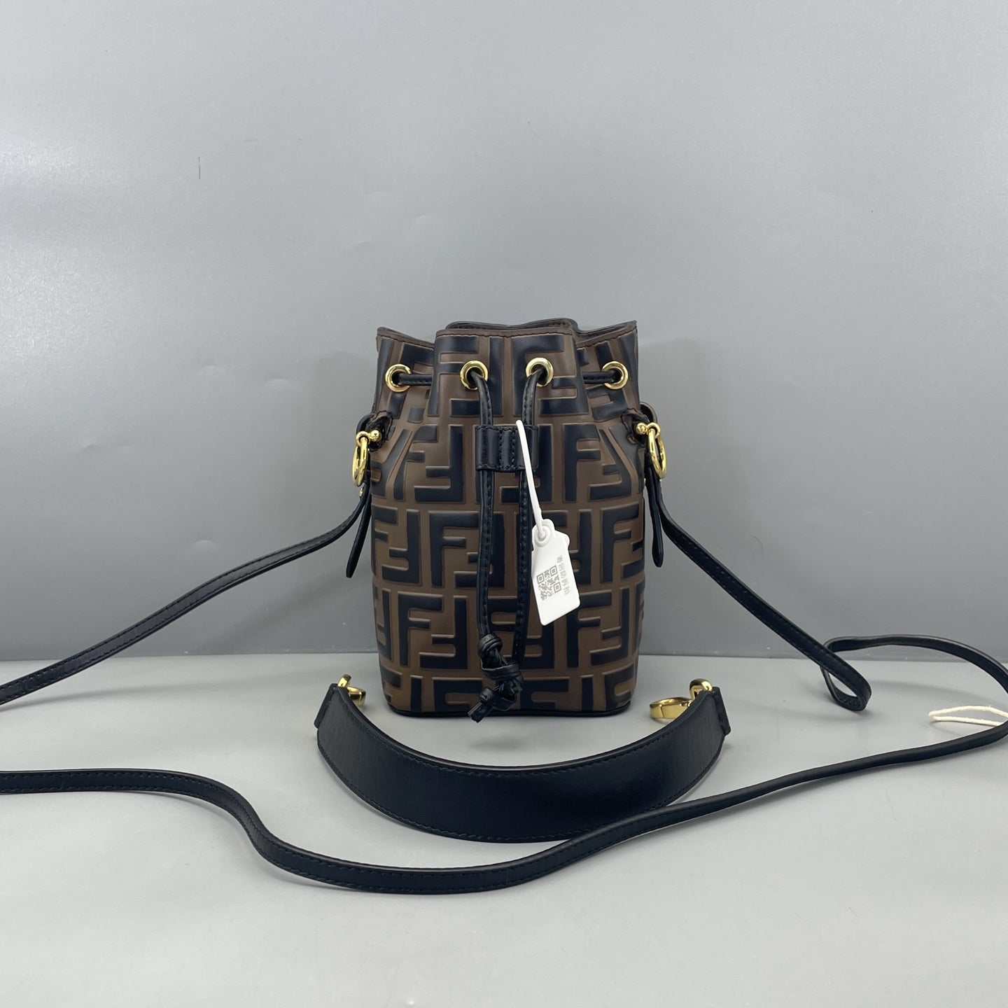 Fendi - Mini Bucket Bag - Embossed FF leather with smooth leather trim - Brown - (mini)