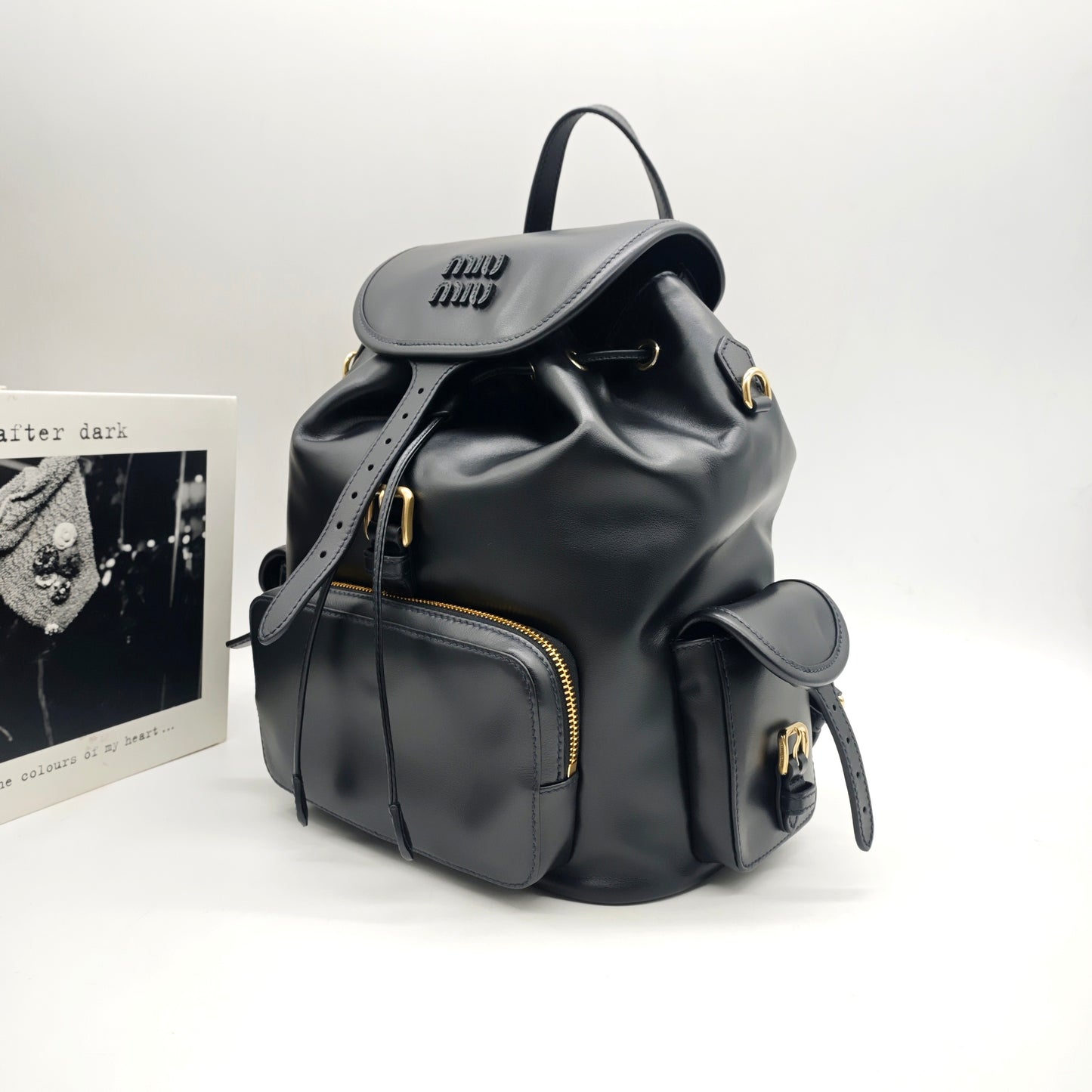 Miu Miu - Drawstring Flap Backpack - Leather - Black - (medium)