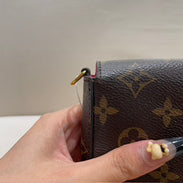 Louis Vuitton - Pochette Félicie - Monogram coated canvas with grained leather trim and interior - Brown - (mini)