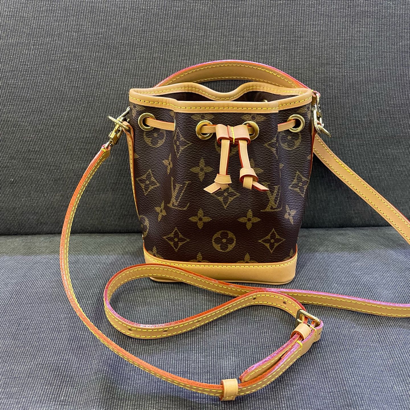 Louis Vuitton - Noe Nano - Monogram coated canvas with Vachetta leather trim - Brown - (mini)