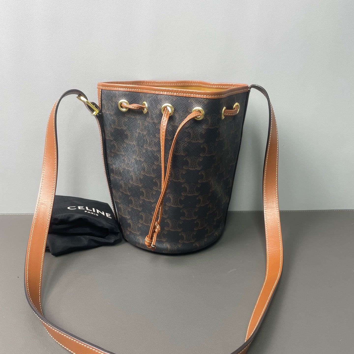 Celine - Triomphe Canvas Drawstring Bucket Bag - Triomphe coated canvas with brown leather trim - Brown - (small)