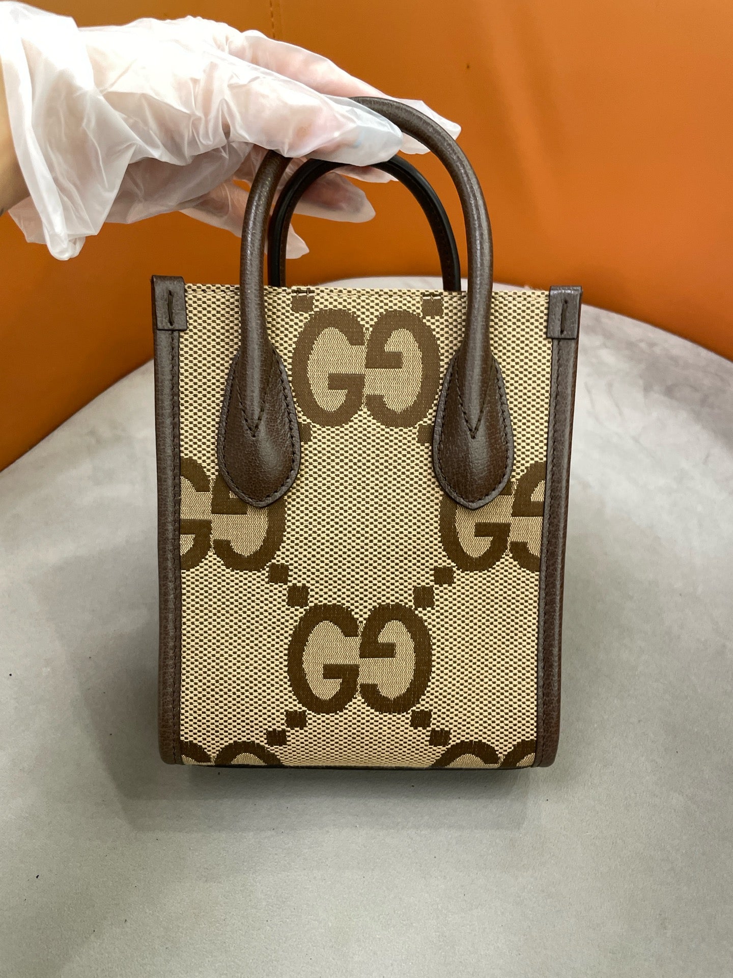 Gucci - Retro Monogram Large Logo Mini Vertical Tote 038 Black Label - Monogram canvas with pebbled leather trim - Brown - (mini)