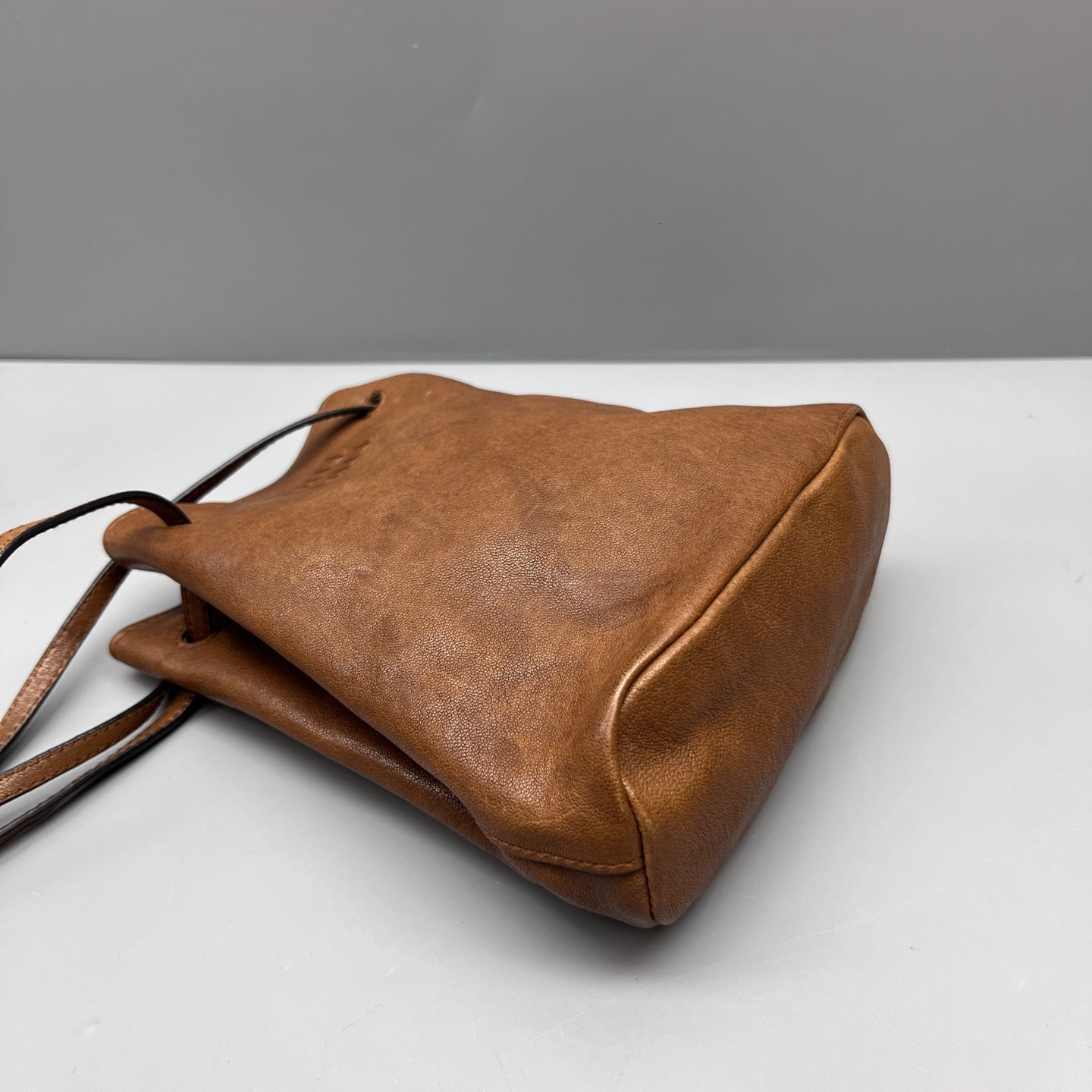 Miu Miu - Drawstring Mini Bucket Bag - Grained leather - Brown - (mini)
