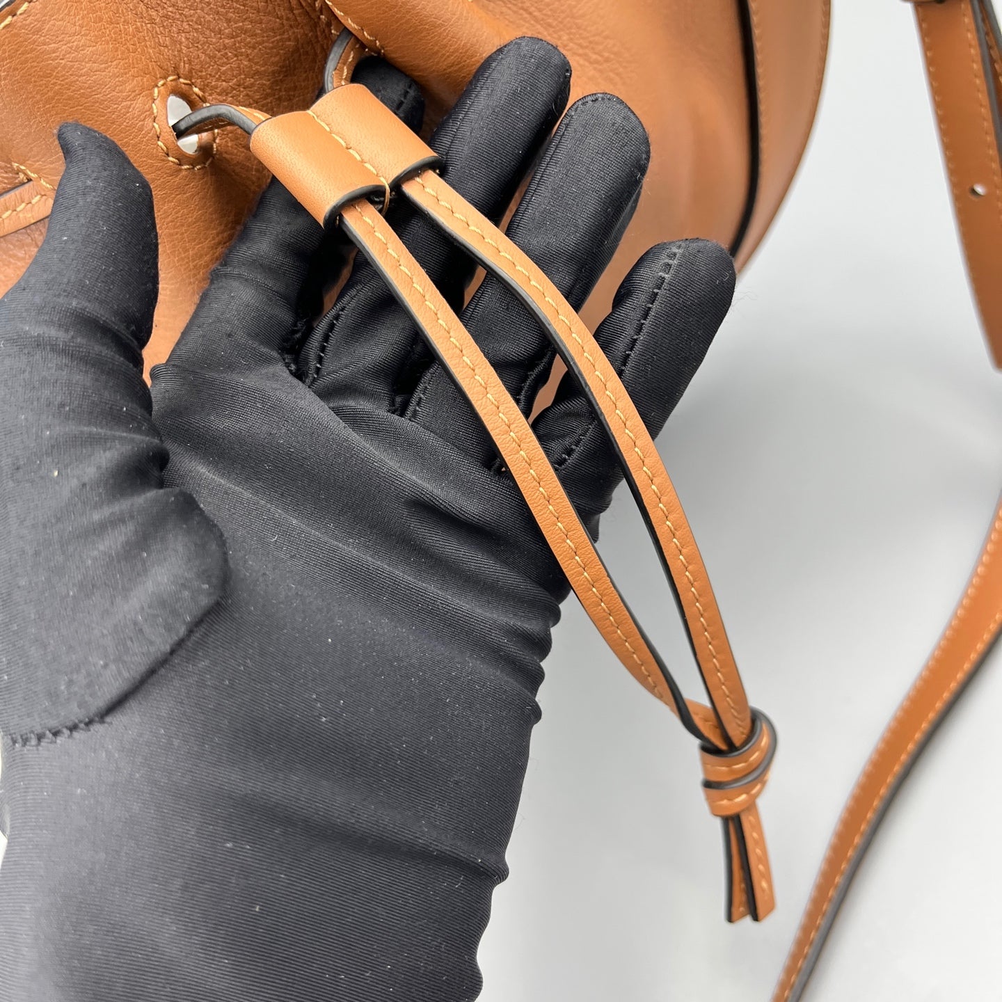 Loewe - Disc Bucket Bag - Pebbled leather and smooth leather trim, suede interior - Caramel - (Small)