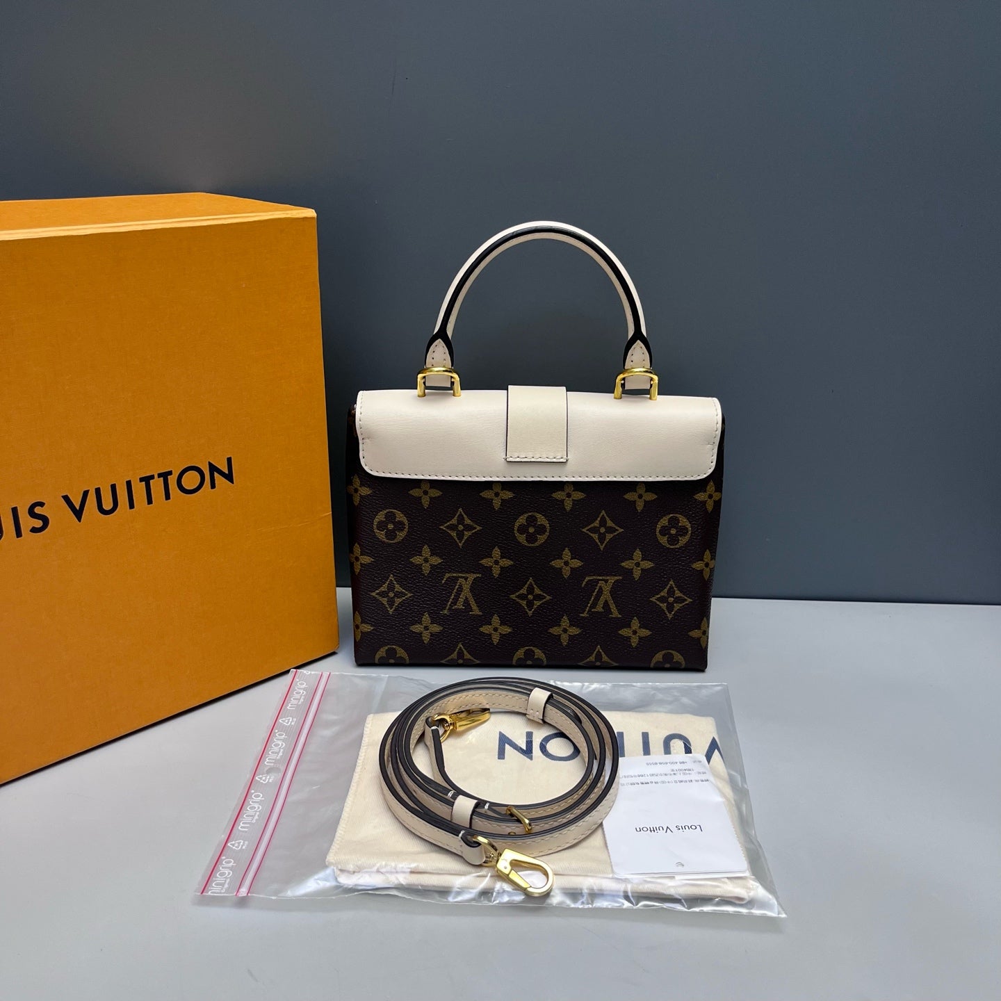 Louis Vuitton - Locky BB - Monogram coated canvas and cowhide leather - Brown and Cream - (mini)