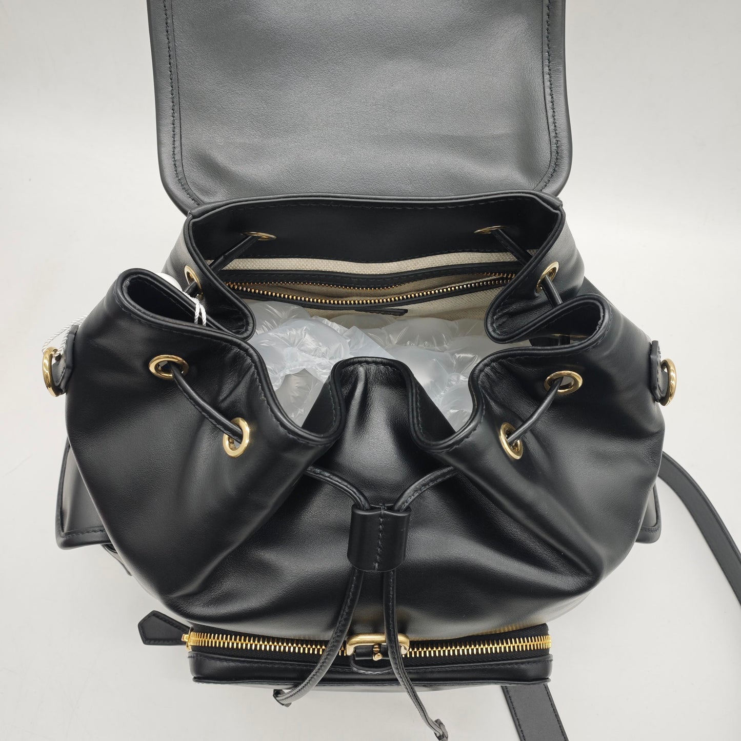 Miu Miu - Drawstring Flap Backpack - Leather - Black - (medium)