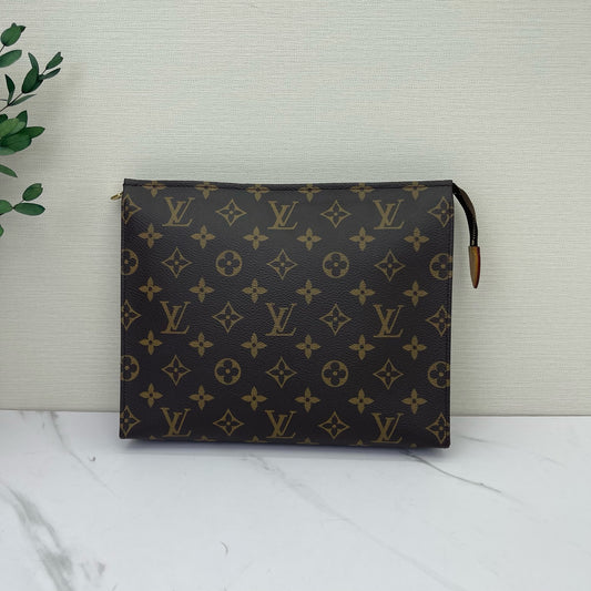 Louis Vuitton - Toiletry Pouch 26 - Monogram coated canvas with Vachetta leather trim - Brown - (medium)